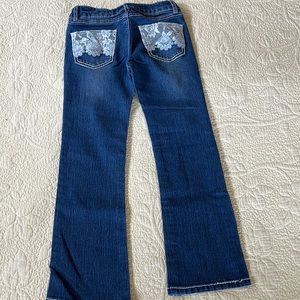 Lace overlay pocket jeans